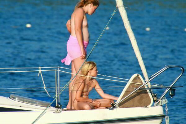 Photo of nudists by the boat [Nudism-Planet]
