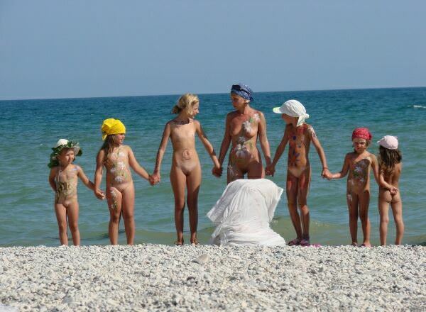 Purenudism photo - on a beach [Nudism-Planet]