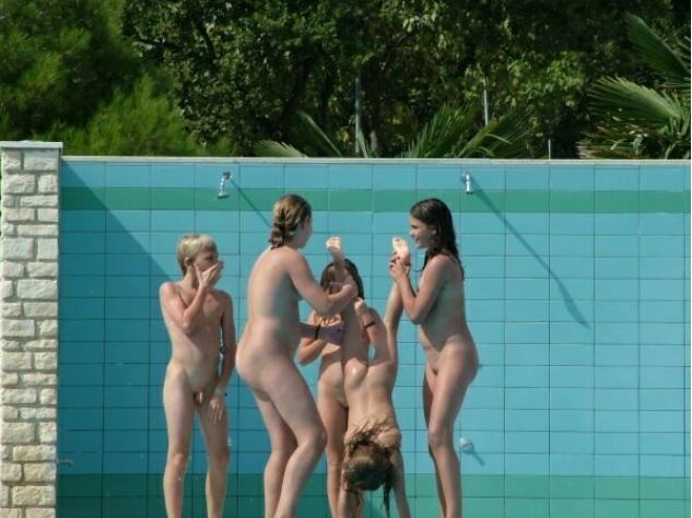 Girls of the nudist wash under a shower [Nudism-Planet]