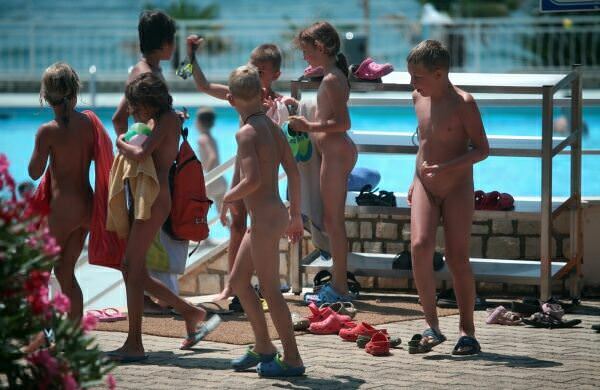 Purenudism family photo - nudists in an aquapark [Nudism-Planet]
